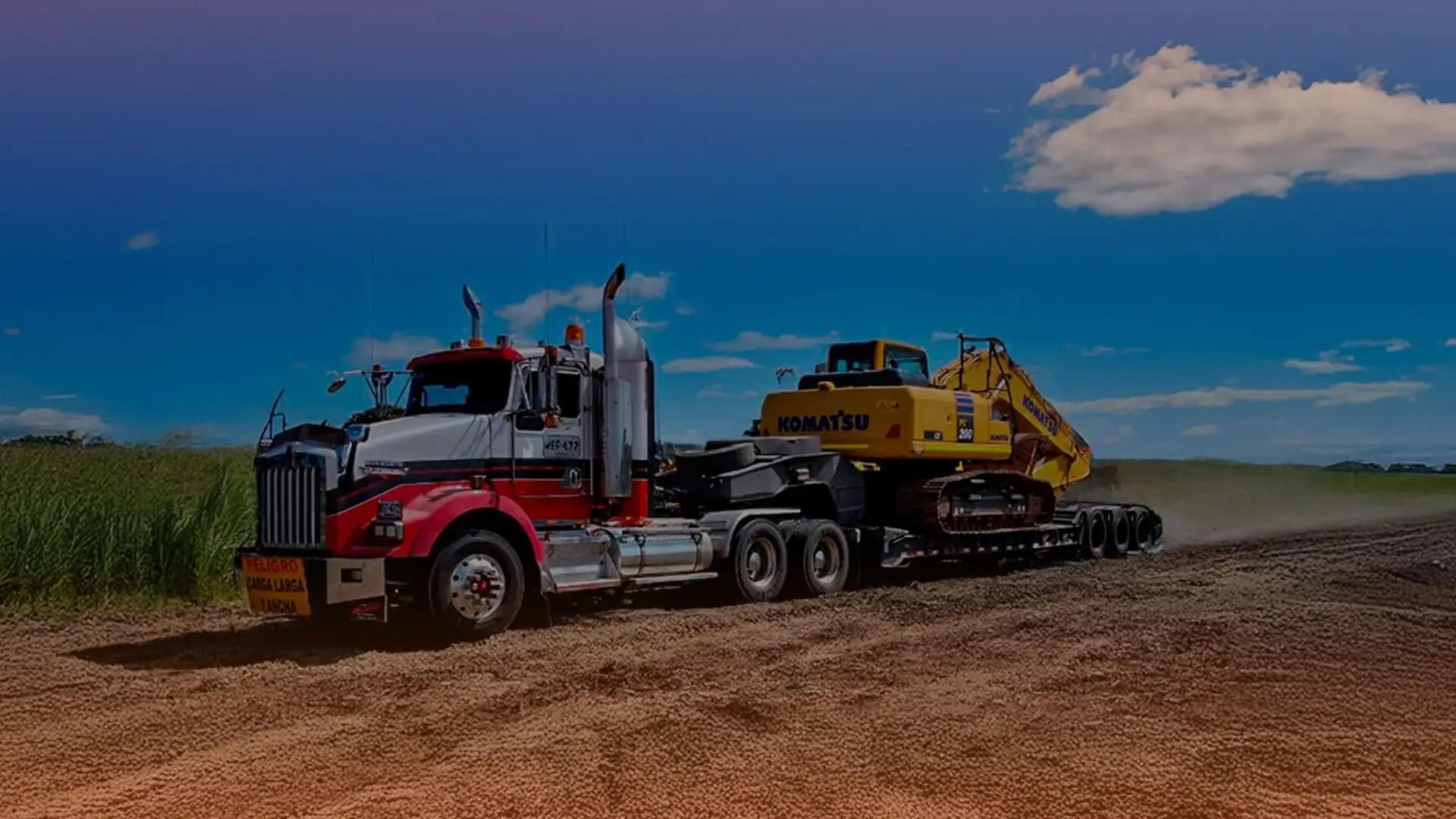 Transporte de retroexcavadora en la ruta Manizales Armenia